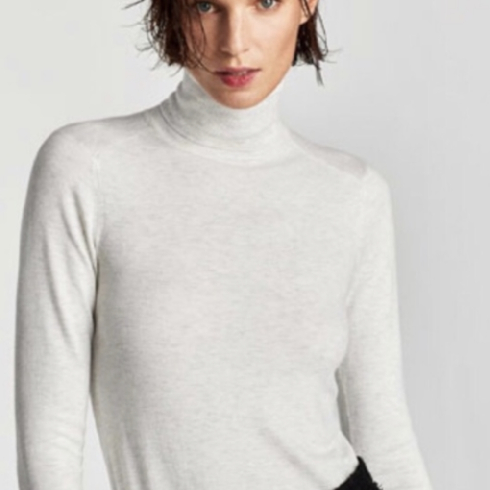 Zara size Small, cream turtleneck with gold button details at the wrists